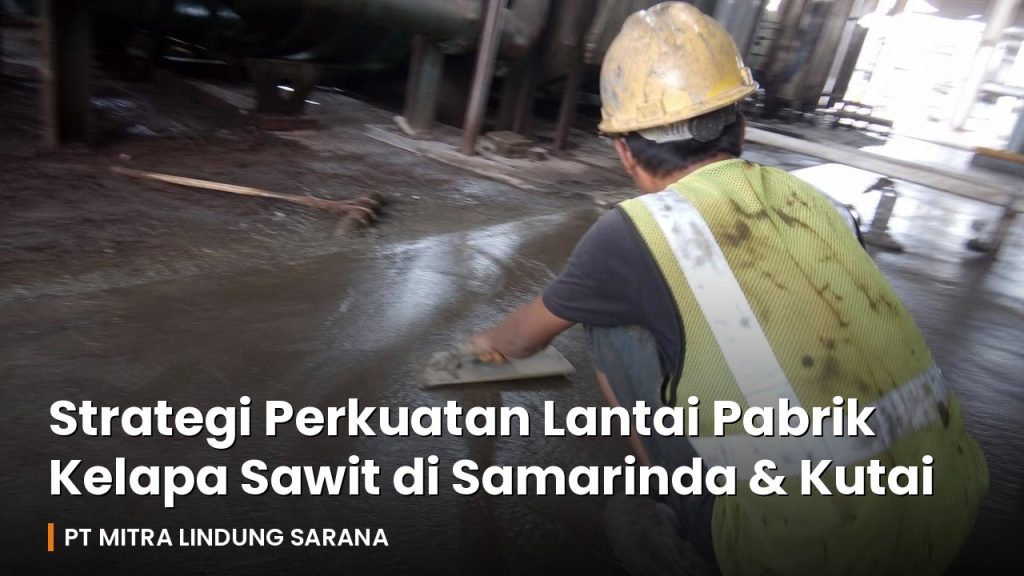 Pekerja meratakan floor hardener di lantai pabrik kelapa sawit di Kalimantan Timur